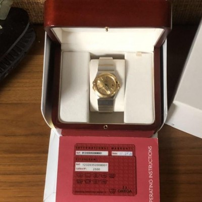 欧米茄星座18K间金男表