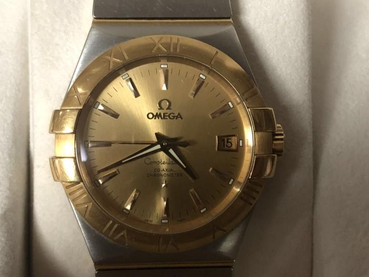 欧米茄星座18K间金男表图2