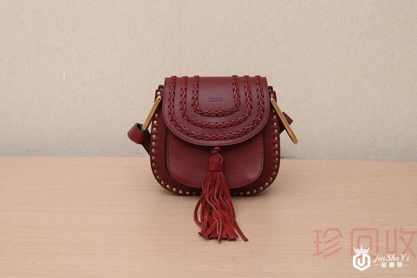 蔻依流苏马鞍包