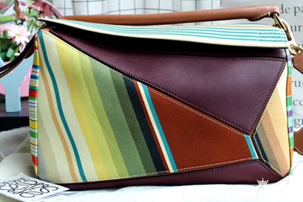 95新罗意威Puzzle系列彩条二手奢侈品包包回收 为何保值率不高